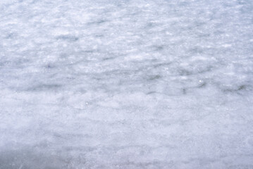 Natural texture of ice, frozen lake  as  background.