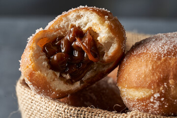 Close-up of the inside of a Berliner stuffed with dulce de leche