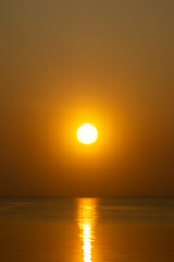 Fototapeta na wymiar Sunset sky at the lake in golden time.