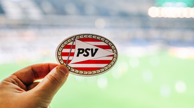September 12, 2021, Eindhoven, Netherlands. The emblem of the PSV Eindhoven football club against the background of a modern stadium.