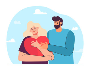 Boyfriend hugging happy girlfriend holding big comic heart. Cheerful cartoon couple flat vector illustration. Love, romance, relationship concept for banner, website design or landing web page