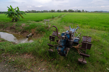 Walking tractor used to plowing park