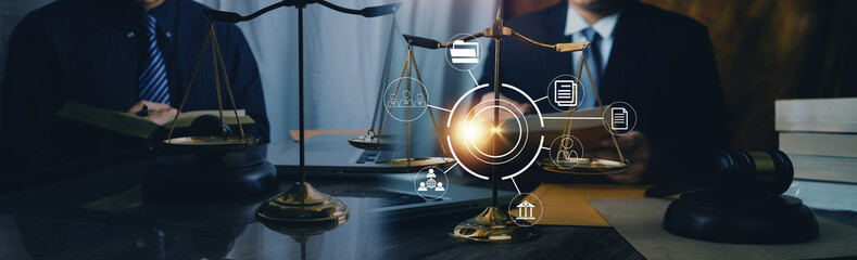 Male lawyer working with contract papers and wooden gavel on tabel in courtroom. justice and law...