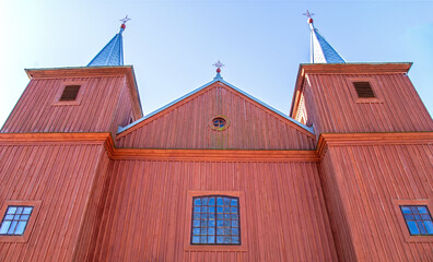 General view and close-up architectural details of the wooden Catholic church of Saint Matthew the...