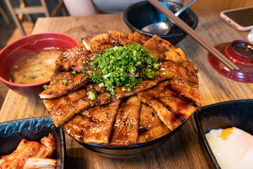 Grilled pork soy sauce with rice, Butadon Tokachi in bowl at restaurant