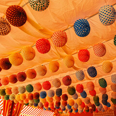 Farolillos de colores en el interior de una caseta de la Feria de Sevilla, España