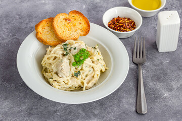 Creamy Spaghetti Carbonara with Chili Flakes, Olive Oil and Fresh Parsley