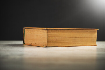 Ancient book on wooden table