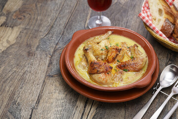 Shkmeruli is a traditional Georgian dish of chicken in garlic milk sauce.