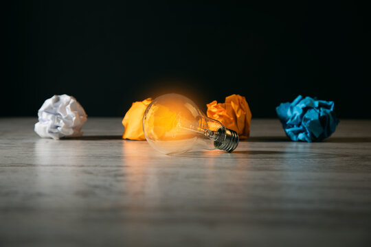 light bulb with crumpled paper