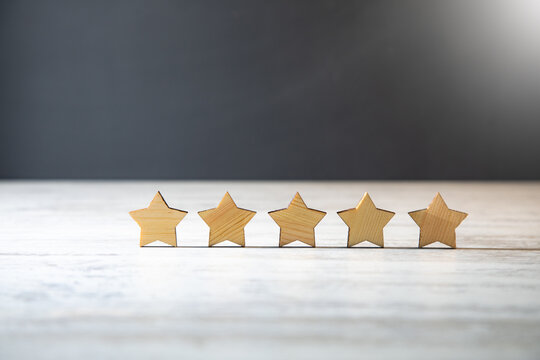 Wooden five star shape on table