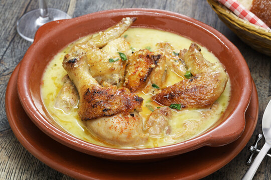 Shkmeruli is a traditional Georgian dish of chicken in garlic milk sauce.