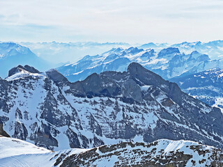 View of the snowy alpine peaks from Säntis, the highest peak of the Alpstein mountain range in the Swiss Alps - Canton of Appenzell Innerrhoden, Switzerland (Schweiz)