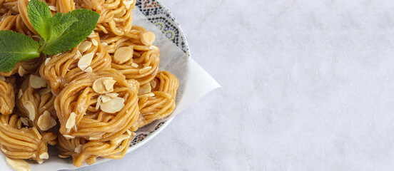 Homemade chebakias pastries, typical Moroccan sweets with honey
