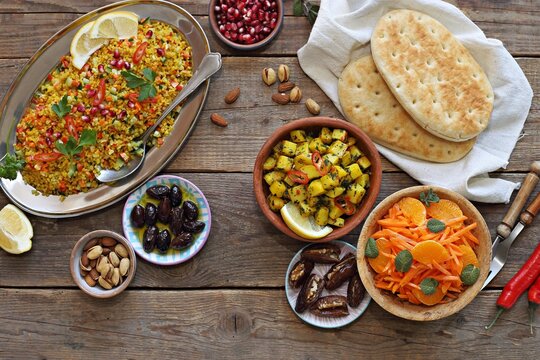  African food table concept. Traditional African or middle eastern dishes assortment. Selective focus