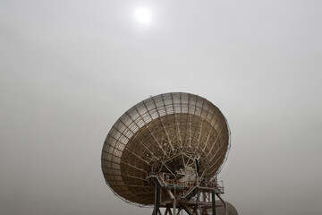 satellite dish radar antenna station in field. parabolic antennas. Big parabolic antenna against...