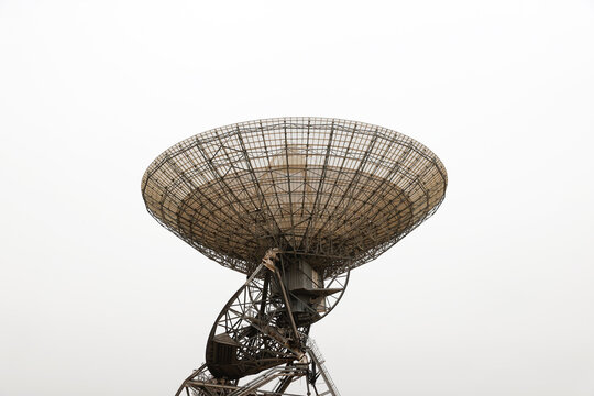 satellite dish radar antenna station in field. parabolic antennas. Big parabolic antenna against sky. Satellite dish at earth station with a sky.