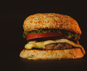 Fresh hamburger on black background