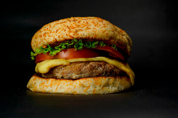 Fresh hamburger on black background