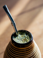 Yerba mate in ceramic matero, bombilla. 