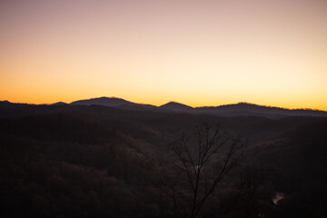 Beautiful sunset over the mountains in a forest in north Georgia 