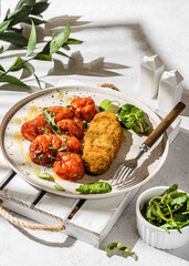 black tomato with oil on a plate