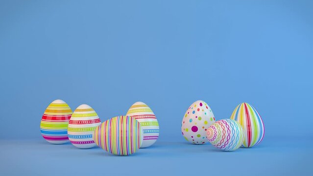 Frohe Ostern - 7 farbenfrohe, bemalte Ostereier auf blauen Hintergrund - Textfreiraum - Ostern