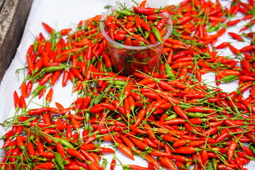 Naklejka premium Brazilian red chili pepper Malagueta (capsicum frutescens) at the street market Ver-o-Peso in Belem, Brazil.