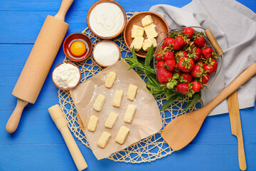 Composition with ingredients for preparing lazy dumplings on color wooden background
