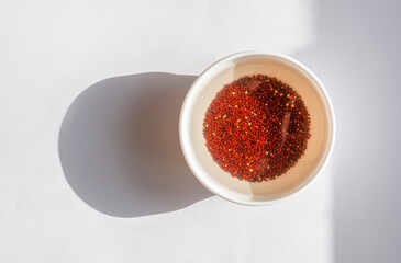 Microgreens seeds soaked in water. Preparation of seeds for germination at home.