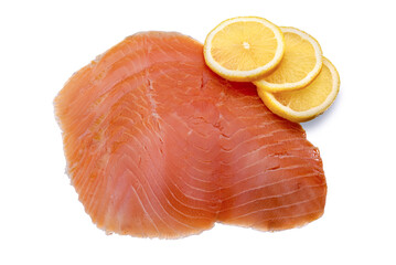 Smoked salmon slices with lemon slices isolated on white background, top view, flat lay