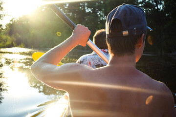 Person in canoe. Boat trip on kayak