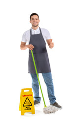 Young male worker of cleaning service with mop and caution sign showing thumb-up on white background