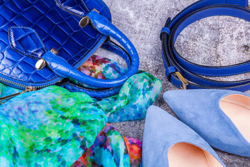 Women's accessories in blue tones, flat lay
