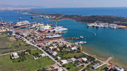 Fototapeta na wymiar Aerial drone photo of shipyard in old port of Salamina island place where historic battle of Salamina took place, Attica, Greece