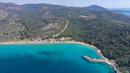 Obraz premium Aerial drone photo of Kanakia beach with crystal clear turquoise sea ideal for quiet vacation close to Athens, Salamina island, Saronic Gulf, Greece