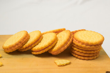 Cheese-flavored biscuits, photo from the top corner, isolated on a white background