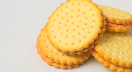 Cheese-flavored biscuits, photo from the top corner, isolated on a white background