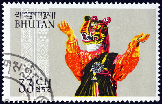 Postage stamp Bhutan 1964 masked dancer