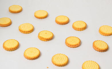 Cheese-flavored biscuits, photo from the top corner, isolated on a white background