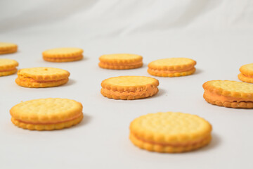 Cheese-flavored biscuits, photo from the top corner, isolated on a white background