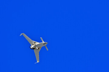Small Canard style aircraft with downward pointing winglets viewed from below 