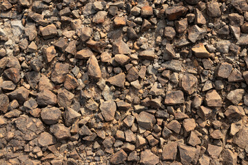Rocks and small rubble in ground