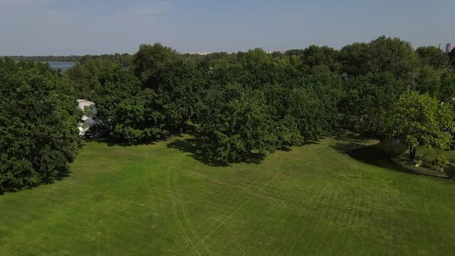 View from a height of green trees. Drone video.