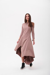Fashion shooting in studio . Professional model , fashionable clothes and style, new collection. stylish look