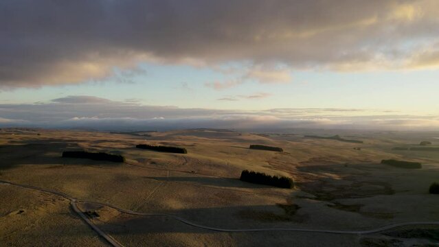 Above French Lowland by Drone at Sunrise With Clouds