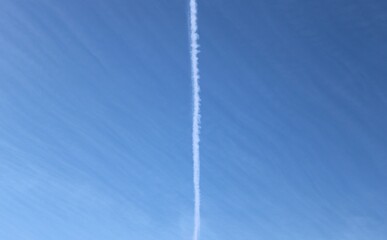 White line in the blue sky and beautiful clouds 