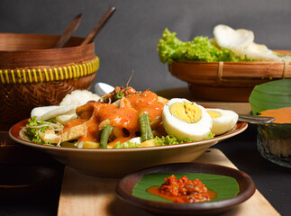 Gado-gado is an Indonesian mix veggies salad served with peanut sauce, popular in Jakarta.