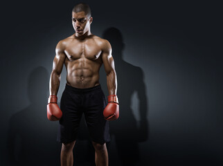 Fototapeta na wymiar Male Athlete Boxer Punching. Sport background. 