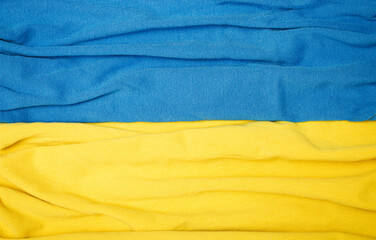 Ukraine flag background with fabric texture wave.
